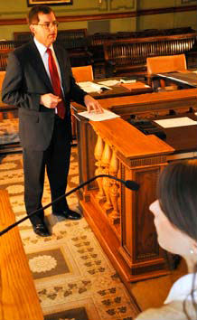 attorney deposing a witness in courtroom about a document 