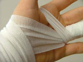 Injured hand wrap in a bandage 