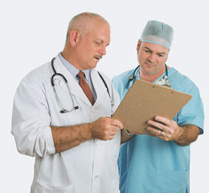 doctor and surgeon look at clipboard 